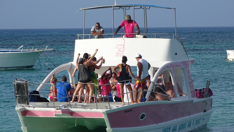 people dancing on party boat