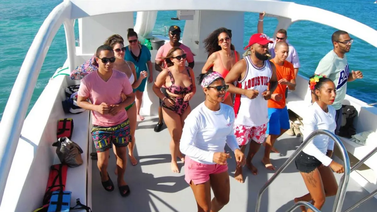 people dancing on boat