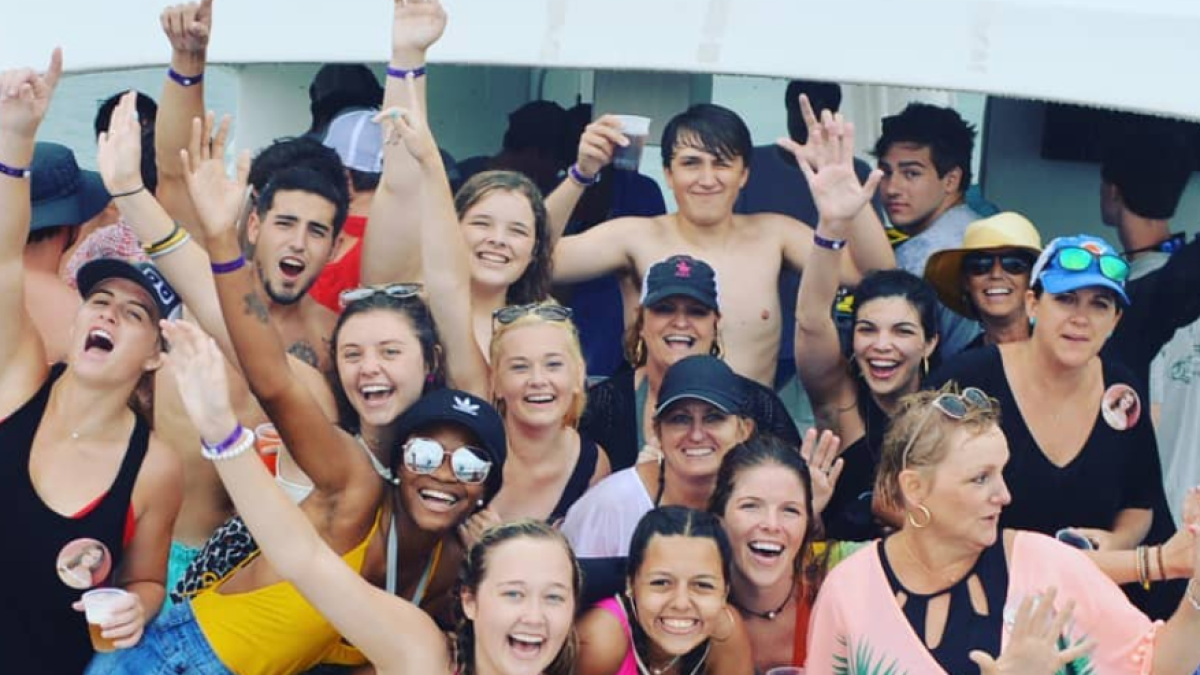 people posing for a picture on party boat