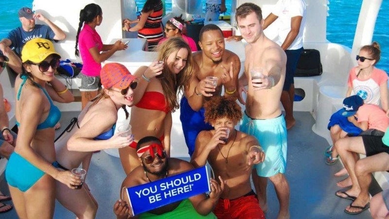 group posing for a picture on boat