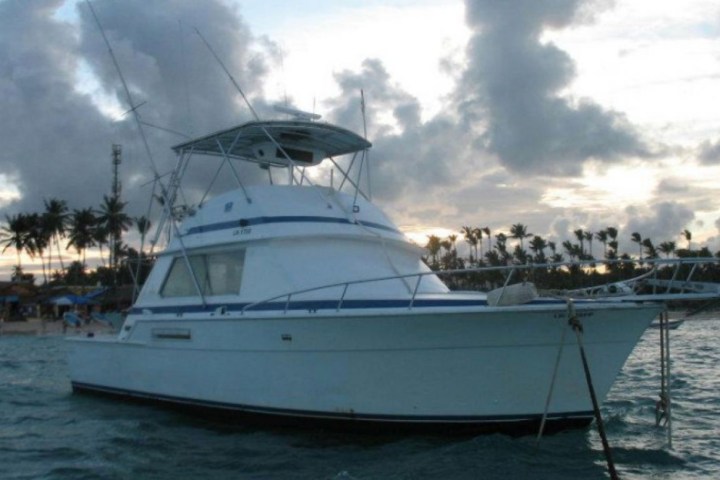 a small boat in a large body of water