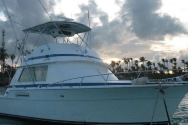 a boat is docked next to a body of water